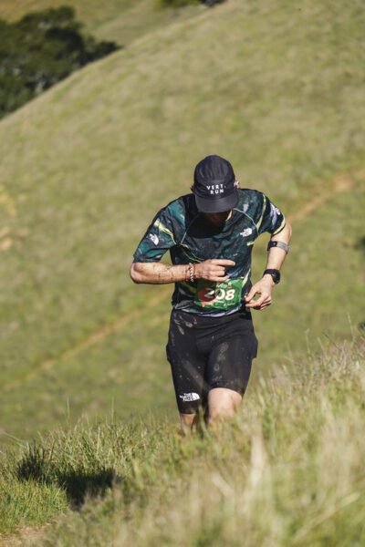 Trail runner competing in a mountain 50K race